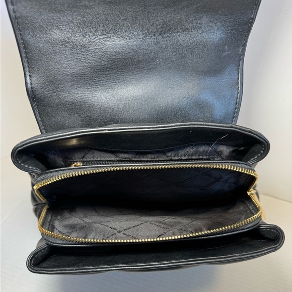 Michael Kors Serena MD Quilted Leather Flap Backpack in black. main image 5